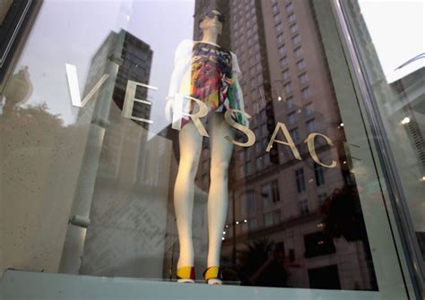 michael kors nears deal to buy versace|is versace still in business.